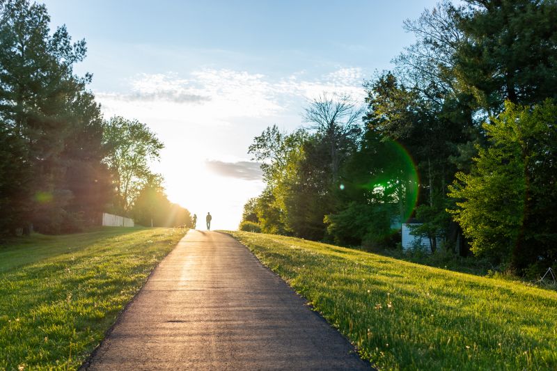 Asphalt Paving at Sunset